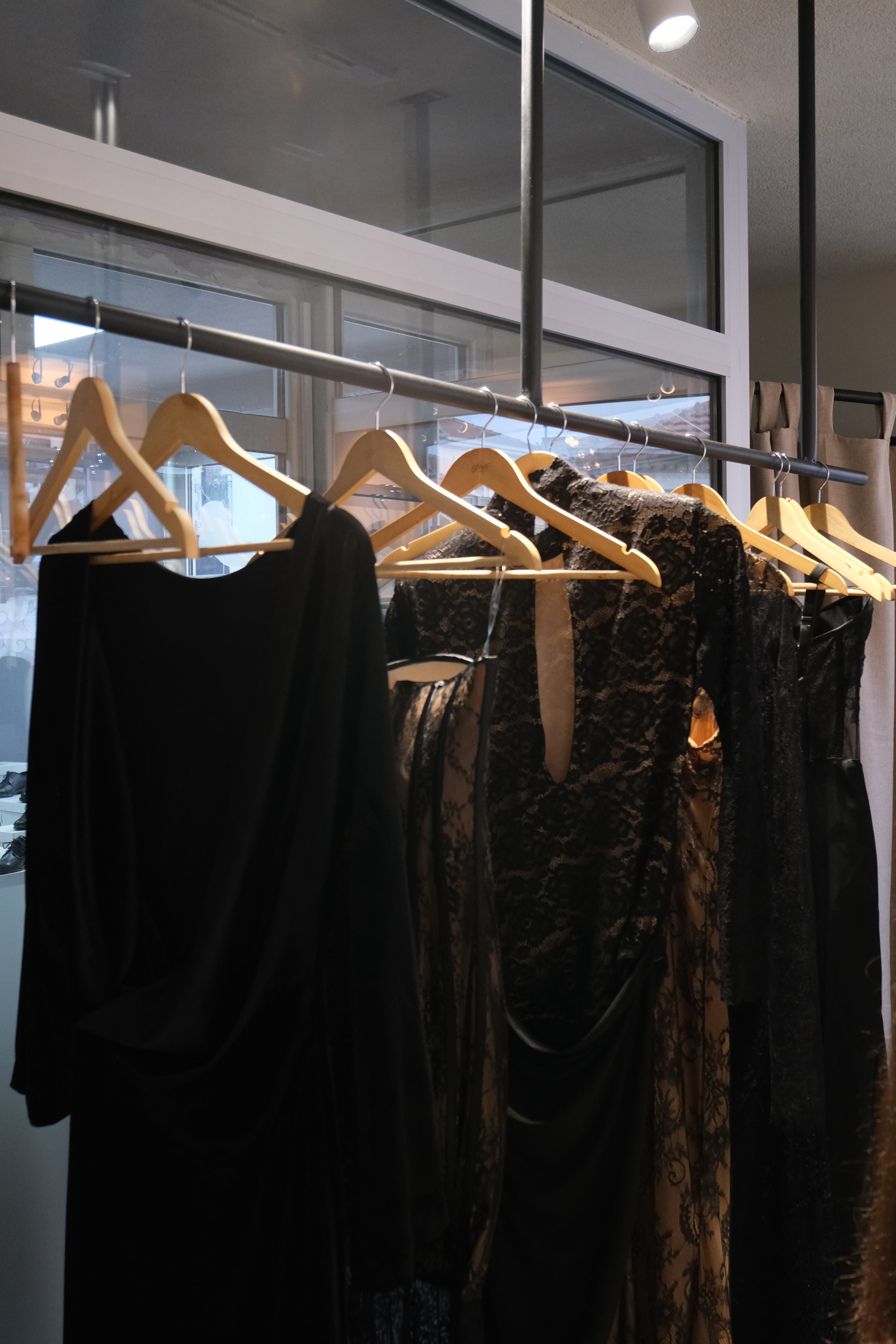 The full RABEL collection hanging on the rail at the showroom opening